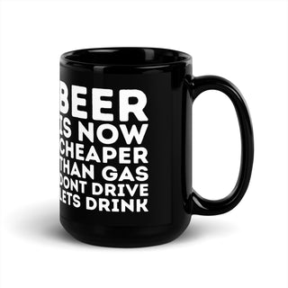 Beer is now cheaper than gas. Dont drive. Lets drink. Black 15oz coffee mug. overland365.com