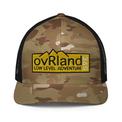 Green MultiCam FlexFit Trucker Cap with our Low Level Adventure yellow logo. front facing. overland365.com