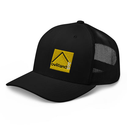 Black Snap Back Trucker Cap with our square 365 logo. side facing. overland365.com